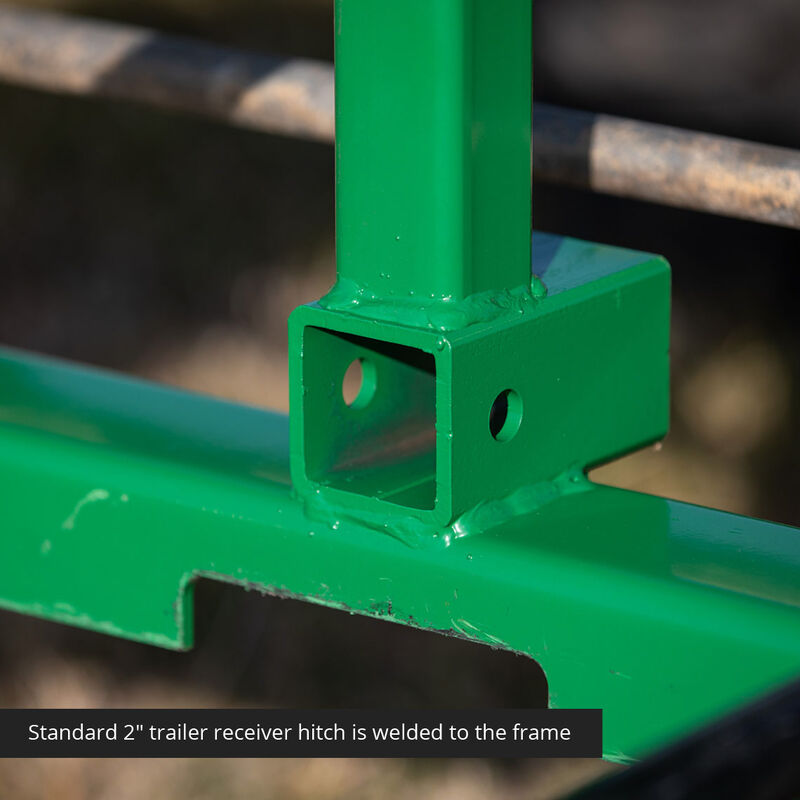 Standard 2-inch trailer receiver hitch is welded to the frame